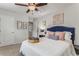 Cozy bedroom with plush bedding, carpeted floors, and a ceiling fan at 224 Shoals Bridge Rd, Acworth, GA 30102