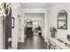 Inviting entryway with wood floors, a view to the living room, and stylish decor at 224 Shoals Bridge Rd, Acworth, GA 30102