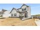Charming two-story home featuring neutral siding, dark shutters, brick accents, and a well-manicured front yard at 224 Shoals Bridge Rd, Acworth, GA 30102