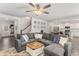 Bright living room with an open floor plan, leading into the kitchen and dining area at 224 Shoals Bridge Rd, Acworth, GA 30102
