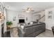 Open-concept living room with hardwood floors and stairs to the upper level at 224 Shoals Bridge Rd, Acworth, GA 30102