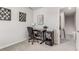 Cozy office with a leather chair, wood desk, and a small bookshelf, providing a functional workspace at 224 Shoals Bridge Rd, Acworth, GA 30102