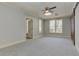 Bright basement space with large windows, carpet floors, and ample natural light at 8155 Legends View Ct, Cumming, GA 30028