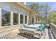 Inviting outdoor patio with dining area featuring comfortable seating and scenic views at 8155 Legends View Ct, Cumming, GA 30028
