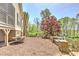 Stone patio with room for outdoor seating, perfect for entertaining guests at 8155 Legends View Ct, Cumming, GA 30028
