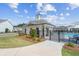 Community clubhouse with a pool view and well-maintained landscaping at 161 Basil St, Cumming, GA 30040