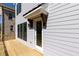 Spacious deck with a door to the inside, perfect for entertaining or enjoying a quiet evening outdoors at 161 Basil St, Cumming, GA 30040