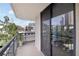 Balcony with black metal railing and sliding door access showcases great city views at 3481 Lakeside Ne Dr # 807, Atlanta, GA 30326