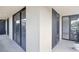 Corner balcony with black metal railing and multiple sliding doors offers extended outdoor living at 3481 Lakeside Ne Dr # 807, Atlanta, GA 30326