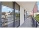 Balcony with black metal railing and sliding doors offers great city views at 3481 Lakeside Ne Dr # 807, Atlanta, GA 30326