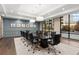 Modern conference room with large windows, sleek chairs, and city views at 3481 Lakeside Ne Dr # 807, Atlanta, GA 30326