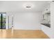 Open layout featuring hardwood floors, modern finishes, and natural light with balcony access at 3481 Lakeside Ne Dr # 807, Atlanta, GA 30326