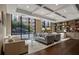 Comfortable lounge with plush seating, hardwood floors, and bright windows at 3481 Lakeside Ne Dr # 807, Atlanta, GA 30326