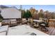 Inviting outdoor deck furnished with cozy seating and a dining set, ideal for relaxing and enjoying the outdoors at 4695 Ferncrest Pl, Douglasville, GA 30135