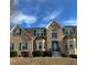 Traditional two-story brick home with green shutters and manicured landscaping at 4695 Ferncrest Pl, Douglasville, GA 30135