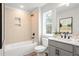 Bathroom featuring a tub, shower, vanity, and ample natural light at 733 Stickley Oak Way, Woodstock, GA 30189
