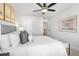 Beautiful bedroom showcasing natural light, stylish decor and ceiling fan at 733 Stickley Oak Way, Woodstock, GA 30189