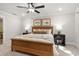 Relaxing bedroom with natural-toned furniture, soft lighting, and a cozy bed for a peaceful retreat at 733 Stickley Oak Way, Woodstock, GA 30189