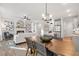 Sun-filled open concept kitchen and living space combination provides views throughout the home at 733 Stickley Oak Way, Woodstock, GA 30189