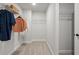 Spacious walk-in closet with wire shelving for optimal storage solutions at 733 Stickley Oak Way, Woodstock, GA 30189