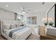 Comfortable bedroom with a bed, desk area, a ceiling fan, and decor at 808 Tupelo Way, Villa Rica, GA 30180
