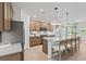 Modern kitchen with stainless steel appliances, a center island, and eat-in dining at 808 Tupelo Way, Villa Rica, GA 30180