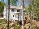 Beautiful backyard with a deck, steps and fenced in yard at 3560 Chattahoochee Rd, Cumming, GA 30041