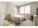 Bedroom featuring a cozy bed and plenty of natural light at 3560 Chattahoochee Rd, Cumming, GA 30041