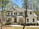 Charming two-story home with a cozy front porch at 3560 Chattahoochee Rd, Cumming, GA 30041