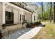 Charming two-story home with a welcoming front porch and professionally landscaped yard at 3560 Chattahoochee Rd, Cumming, GA 30041