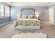 Comfortable main bedroom with large windows and neutral decor that offers lots of natural light at 3560 Chattahoochee Rd, Cumming, GA 30041