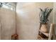 Modern shower with a neutral tile surround, a rainfall showerhead and decor at 3560 Chattahoochee Rd, Cumming, GA 30041