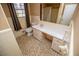 Bright bathroom featuring a large counter with cabinet storage at 6355 Valhalla Dr, Douglasville, GA 30135