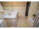 Bathroom featuring large counter with storage and shower with tub at 6355 Valhalla Dr, Douglasville, GA 30135