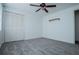 Bedroom with carpet, and closet with shutter doors at 6355 Valhalla Dr, Douglasville, GA 30135