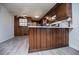 Galley kitchen featuring stainless steel appliances and wood cabinetry at 6355 Valhalla Dr, Douglasville, GA 30135
