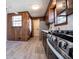 Galley kitchen featuring stainless steel appliances, wood cabinetry, and an open layout at 6355 Valhalla Dr, Douglasville, GA 30135