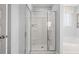 Bathroom with glass shower door, tile floor and neutral color palette at 640 Kimberwick Dr, Locust Grove, GA 30248