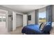 Inviting bedroom with a large window and open closet space, offering a cozy feel at 640 Kimberwick Dr, Locust Grove, GA 30248