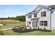Beautiful home with well-maintained lawn and landscaped garden beds at 640 Kimberwick Dr, Locust Grove, GA 30248