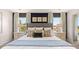 Beautiful bedroom with luxurious bedding, ample natural light, and stylish decor at 640 Kimberwick Dr, Locust Grove, GA 30248