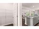 Walk-in pantry adjacent to kitchen with wire shelving for storage at 640 Kimberwick Dr, Locust Grove, GA 30248