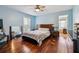Spacious bedroom with hardwood floors, and natural light at 9975 Holly Hill Way, Jonesboro, GA 30238