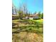 Sprawling backyard featuring a detached building, perfect for outdoor activities and relaxation at 2958 Klondike Rd, Lithonia, GA 30038