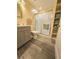 Well-maintained bathroom with a shower, toilet, vanity, and storage for towels at 2958 Klondike Rd, Lithonia, GA 30038