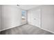 Cozy bedroom with soft gray carpet, white trim, and closet doors at 3313 Summit Creek Ln, Loganville, GA 30052