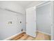 Dedicated laundry room with modern flooring, shelving, and laundry hookups at 3313 Summit Creek Ln, Loganville, GA 30052