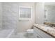 Bathroom showcasing modern tile work and a stylish granite vanity at 446 Martindale Ct, Stone Mountain, GA 30088