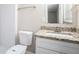 Bathroom featuring a granite vanity and a tiled shower/tub combo at 446 Martindale Ct, Stone Mountain, GA 30088