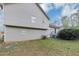 Backyard featuring mature trees and green grass at 6405 Grafton Dr, Austell, GA 30168